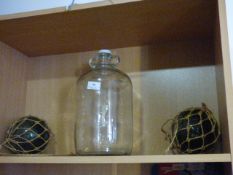 Demi-John and Two Fishing Floats