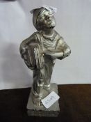 Cast Metal Figurine of a Paper Seller