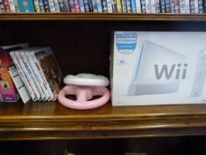 Nintendo Wii + 2 Racing Wheel Controllers and a Collection of games