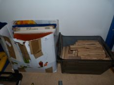 Box of Wood Planks and Sanding Paper