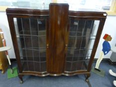 Bow Front Mahogany China Display Enclosed by Leaded Glass Doors on Ball and Claw Feet