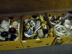 Three Boxes of Decorative Items Including; Hummel Style Figures, Coffee Cans, Teapots, Silver Plated