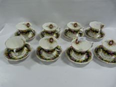 Eight Assorted Royal Albert Tea Cups and Saucers