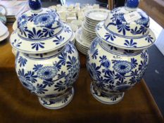 Pair of Blue and White Lidded Vases
