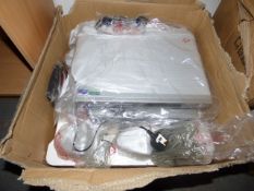 *Box Containing Sharp DVD Player and Surround Sound System