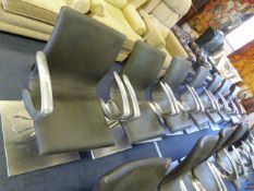 Seven Grey Leatherette Salon Chairs on Chrome Pedestals