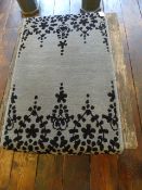 *100% Wool Pile Rug 150cm by 80cm RRP: £125