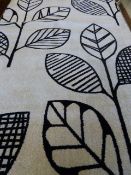 *Contemporary Design Black Leaf on Beige Background 230cm by 160cm RRP: £195