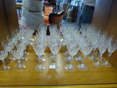 Twenty Four Cut Glass Wine Glasses and Flutes