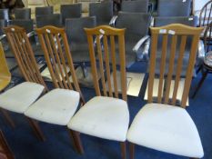 Four Beech Effect Dining Chairs with Upholstered Seats