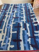 *100% Wool Contemporary Design Blues and Grey Rug 230cm by 160cm RRP: £289