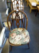 Two Wheel Back Dining Chairs
