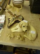 Four Assorted Labrador Figurines