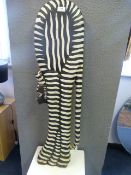 Black and White Wooden Sculpture of a Cat