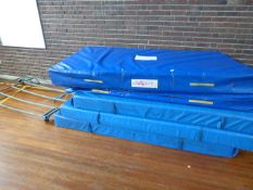 *Eight Crash Mats and a Trolley