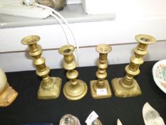 Four Brass Candlesticks