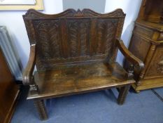 Oak Settle with Carved Back, Arms and Legs