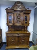 Elaborately Carved Oak Cupboard