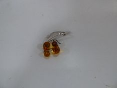 Pair of Amber Earrings and Silver Brooch