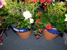*PAIR OF ARTIFICIAL FLOOR PLANTERS