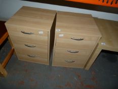 Pair of Three Drawer Bedside Cabinets in Light Wood Finish and Silver Handles