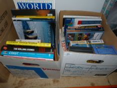 Two Boxes Containing Hard and Paperback Books on Cycling, Popular Music and Travel