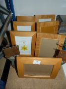 Seven Modern Beech Photo Frames and a Pair of Sculptures