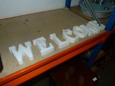 Wood Letters Spelling Welcome