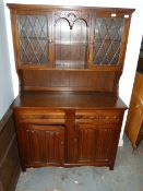 Oak Priory Style Dresser with Linen Fold Panels and Leaded Glass Doors