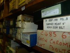 *Seventeen Boxes of Surface Door Bolts, Slotted Glass Plates, Etc