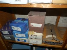 *Nine Boxes of Brass Hat and Coat Hooks