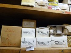 *Fourteen Boxes of Card Frames, Brass Time Cheques, Etc