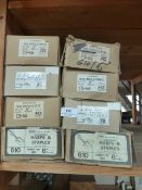 *Eight Boxes Containing Wire Hasps, and Staples