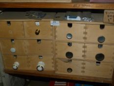 *Two Sets of Six Drawers Containing Ceramic, Brass and Aluminium Door Knobs