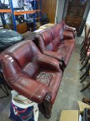 Burgundy Leather Wood Framed Three Seat Settee and Two Arm Chairs