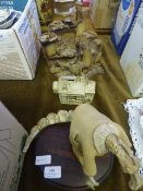 Three Clay Sculptures and a Money Box