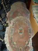 Three Oval Pink Floral Rugs