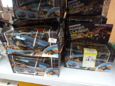 *Sixteen Boxes Containing Four Glass Garden Ornaments