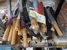*Seventy Umbrellas with Wood Handles