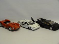 Three Burago 1:18 Scale Collectible Cars. Two Lamborghinis and One Ferrari