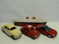 Two Battery Operated Victory Industry Cars, One 1:18 Scale MG Car and a Battery Operated Toy Boat