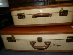 Pair of Graduated Gladiator Suitcases (Tan and Cream)