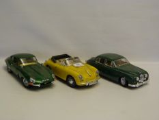 Three 1:18 Scale Cars. Two Jaguars and One Porche