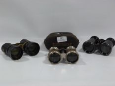 Three Set of Binoculars and a Case