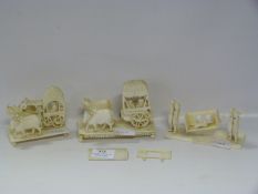 Three Intricately Carved Ivory Sculptures of Chinese Peasants, Oxen and Carts