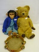 Chimpanzee, a Teddy Bear and a Tambourine