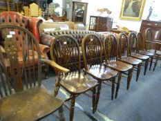 Six Wheel Back Dining Chairs with Two Carvers