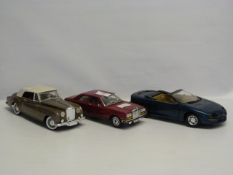 Three Burago 1:18 Scale Collectible Cars. Two Rolls Royce and One Chevrolet