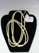 Long Strand of Ivory Beads