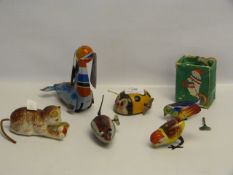 Six Assorted Tin Plate and Other Clockwork Toys
